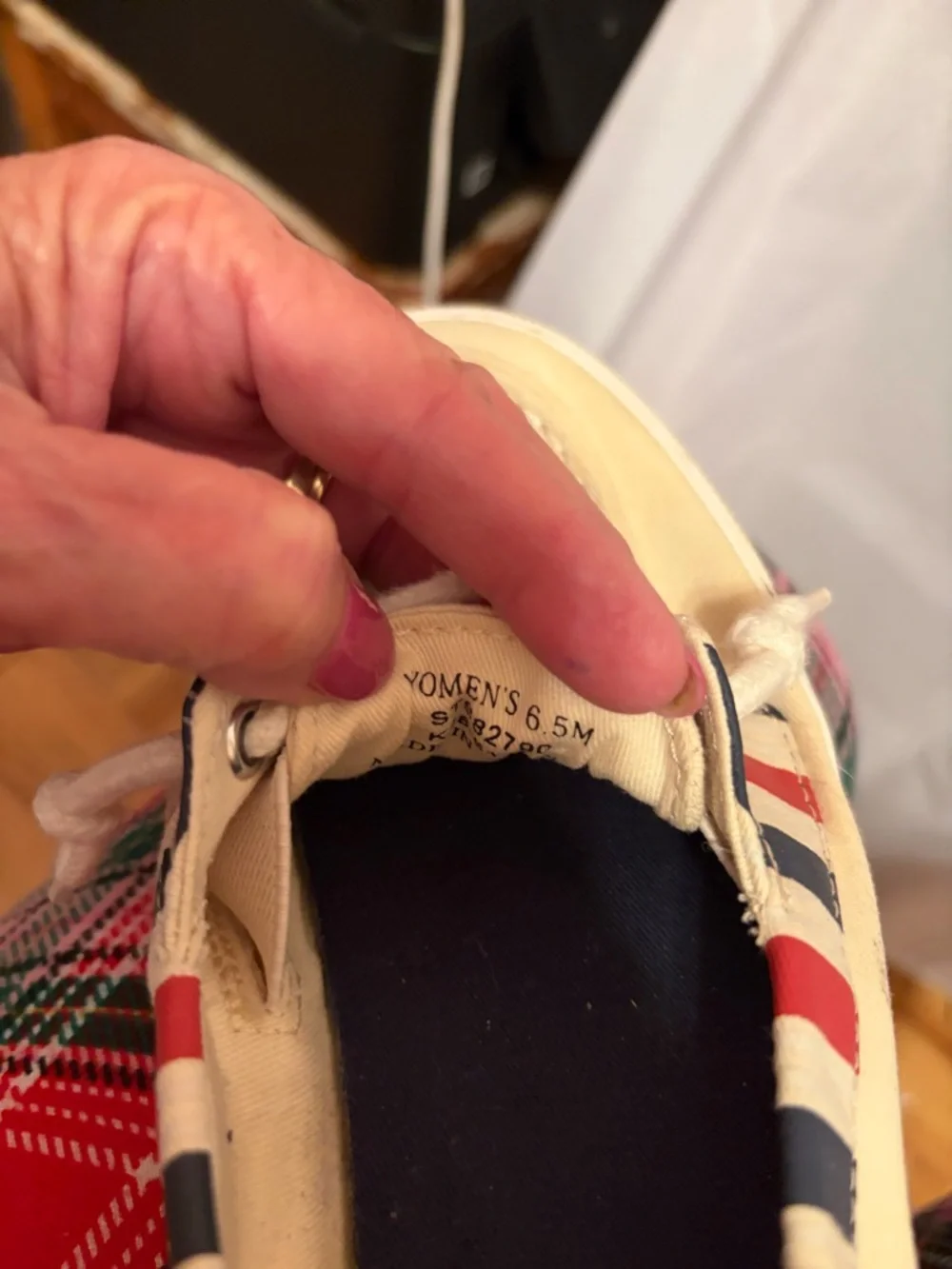 Sperry Lounge Away sneakers in a natural, red, and blue stripes